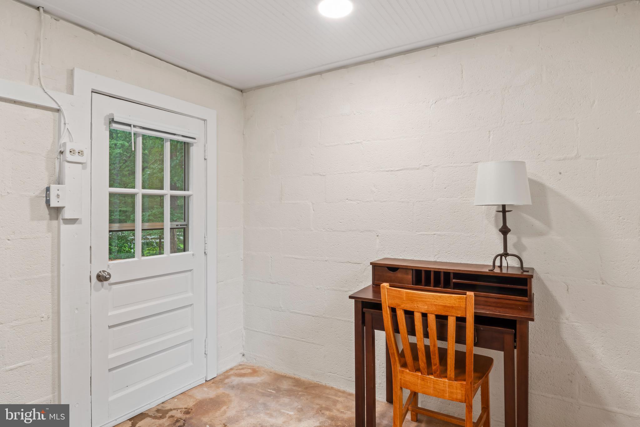 12131 Waples Mill Road Oakton, VA 22124 - Photo 19 of 40 a bedroom with a bed and a window