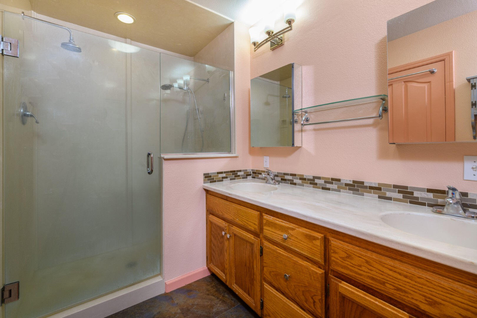 36088 Deer Flat Road Shingletown, CA 96088 - Photo 12 of 23 a bathroom with a granite countertop sink and a mirror