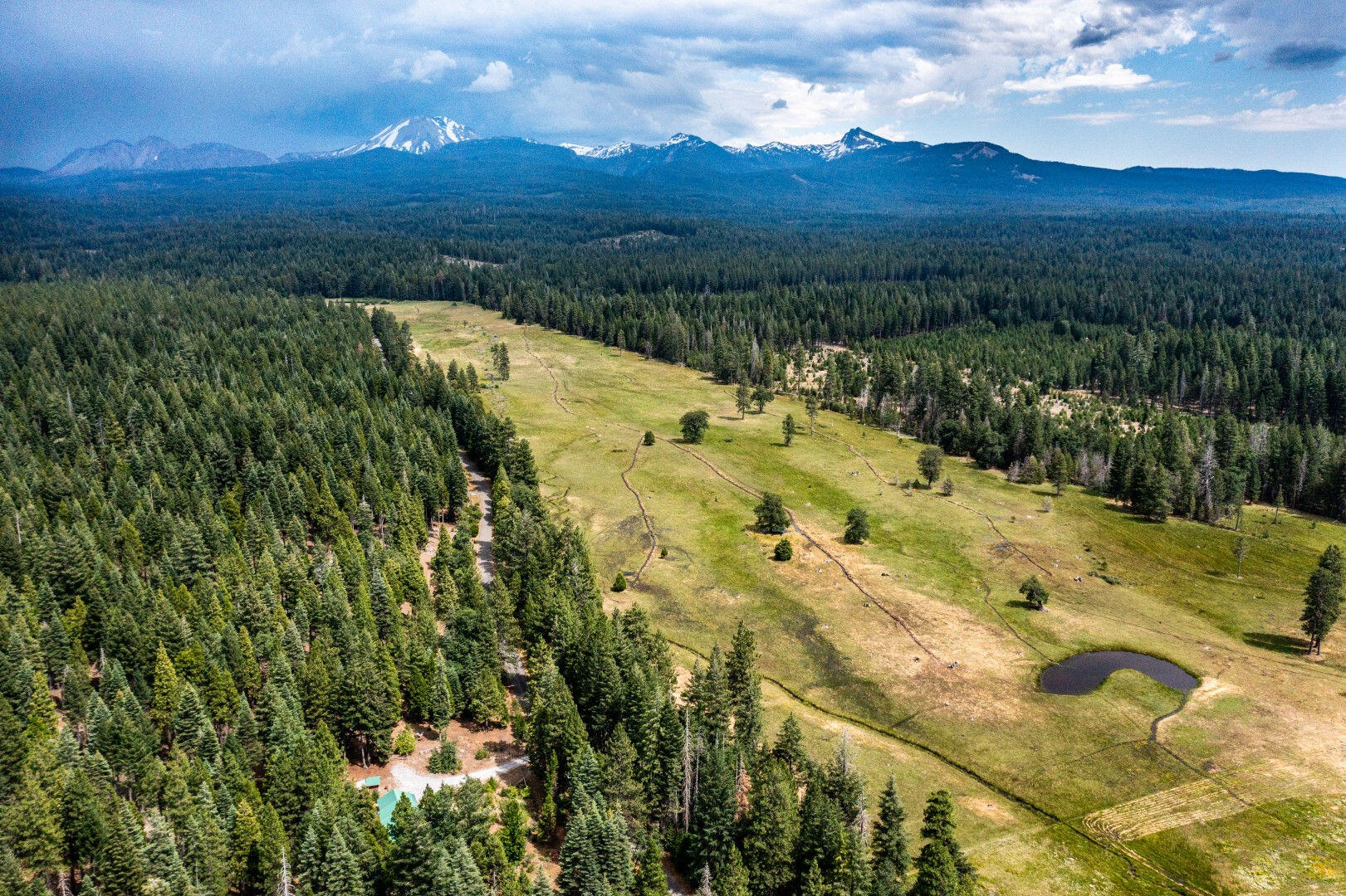 36088 Deer Flat Road Shingletown, CA 96088 - Photo 2 of 21 a view of lake with mountain