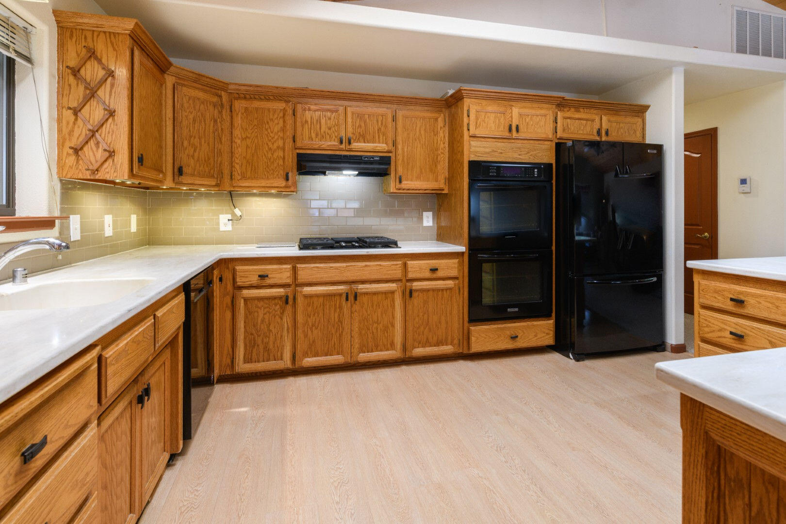 36088 Deer Flat Road Shingletown, CA 96088 - Photo 5 of 21 a kitchen with stainless steel appliances granite countertop a refrigerator and a sink