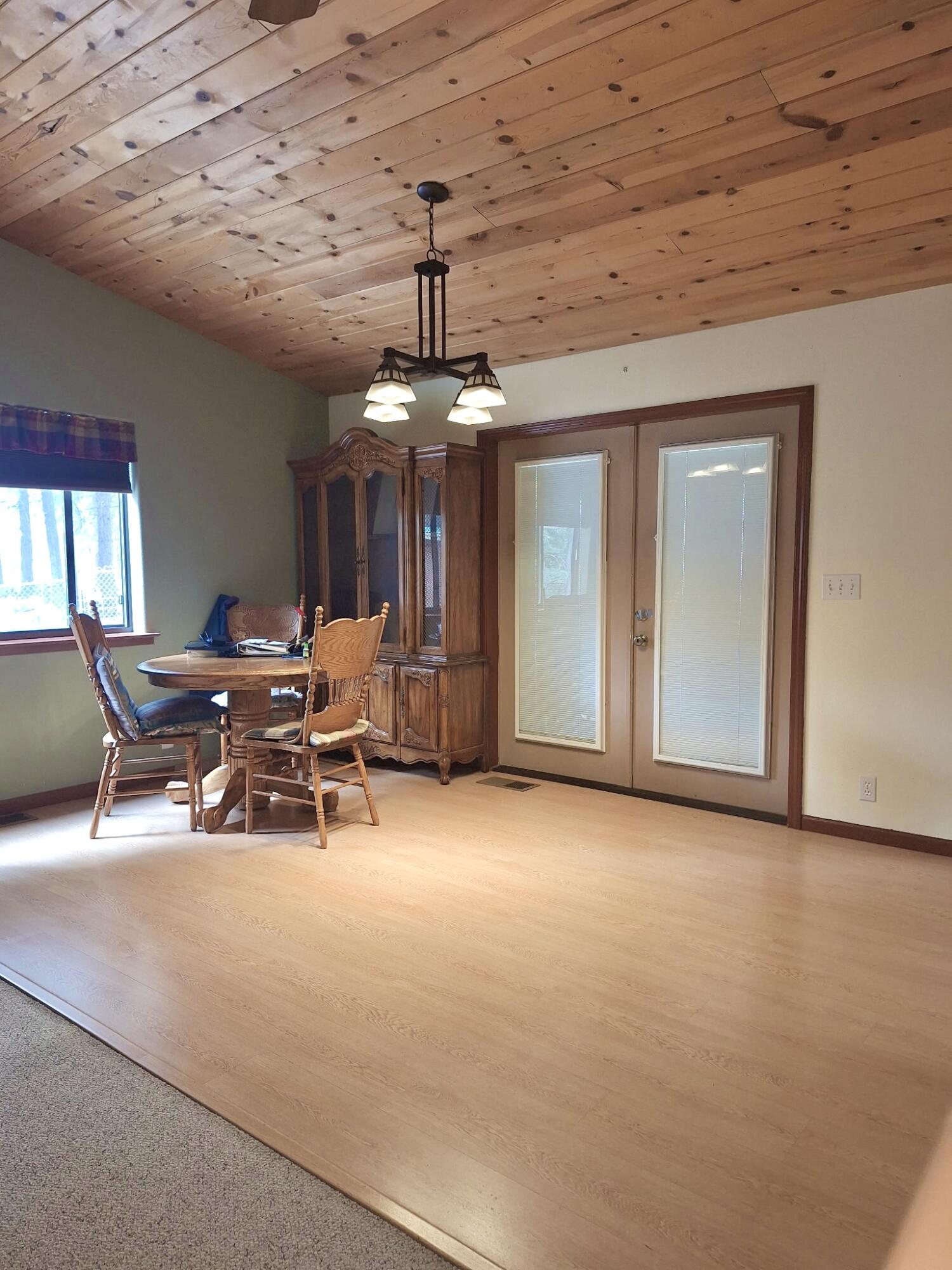 36088 Deer Flat Road Shingletown, CA 96088 - Photo 7 of 23 a view of a livingroom with workspace and a window