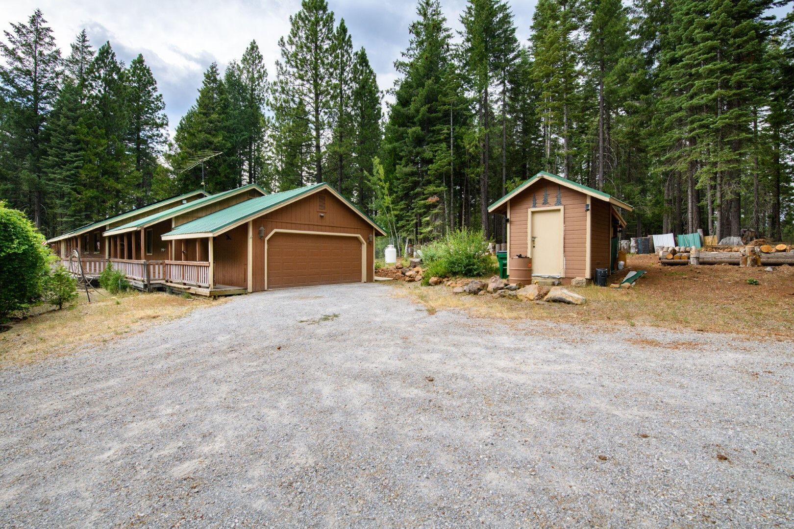 36088 Deer Flat Road Shingletown, CA 96088 - Photo 7 of 21 a view of a house with a yard