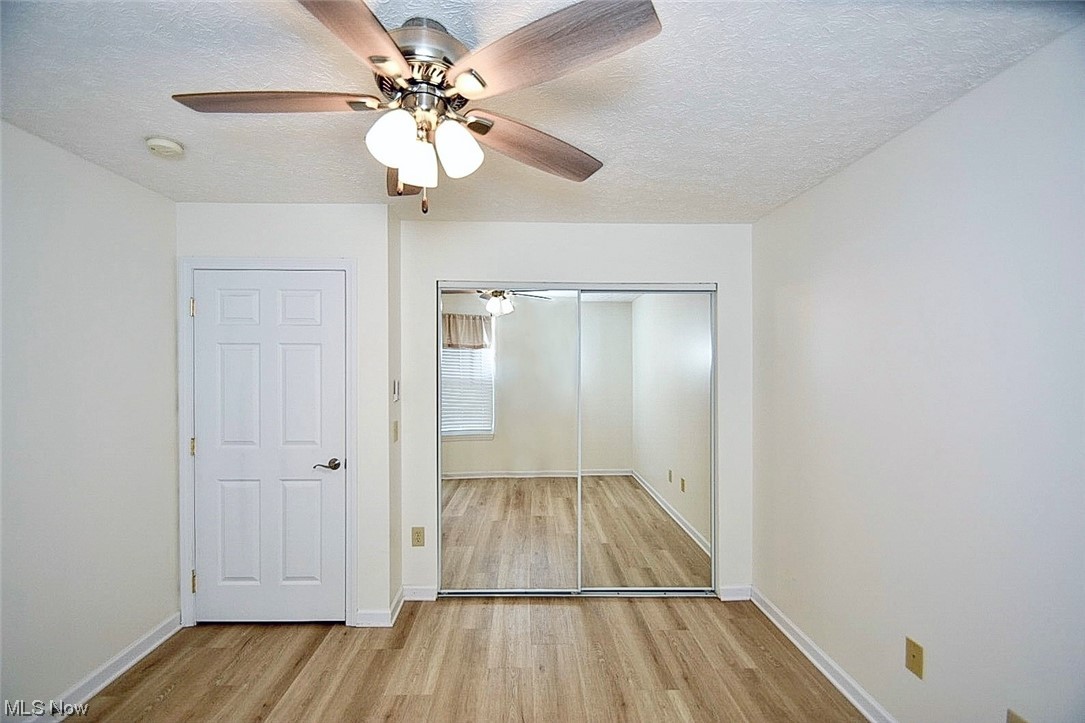 4703 Hills And Dales Road Northwest, Unit 109 Canton, OH 44708 - Photo 20 of 27 Entrance door and closet to second bedroom.