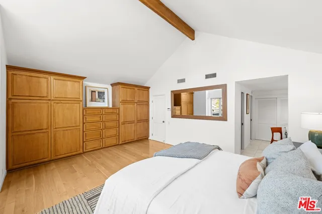 a bed room with a bed and a table