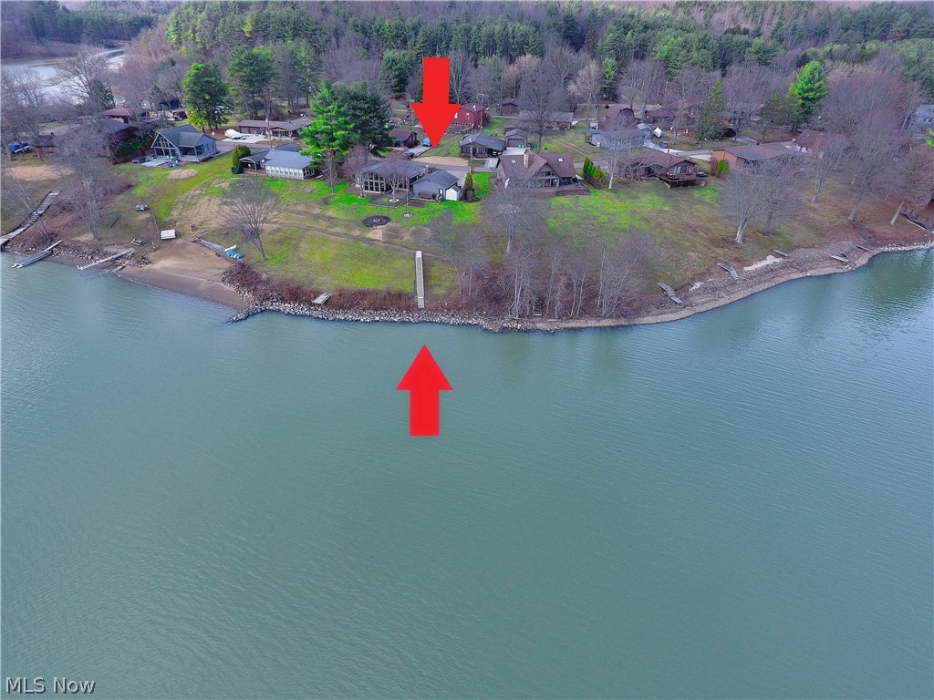 1251 Arrowhead Drive Southwest Dellroy, OH 44620 - Photo 46 of 50 This view shows the dock location and house from the lake.