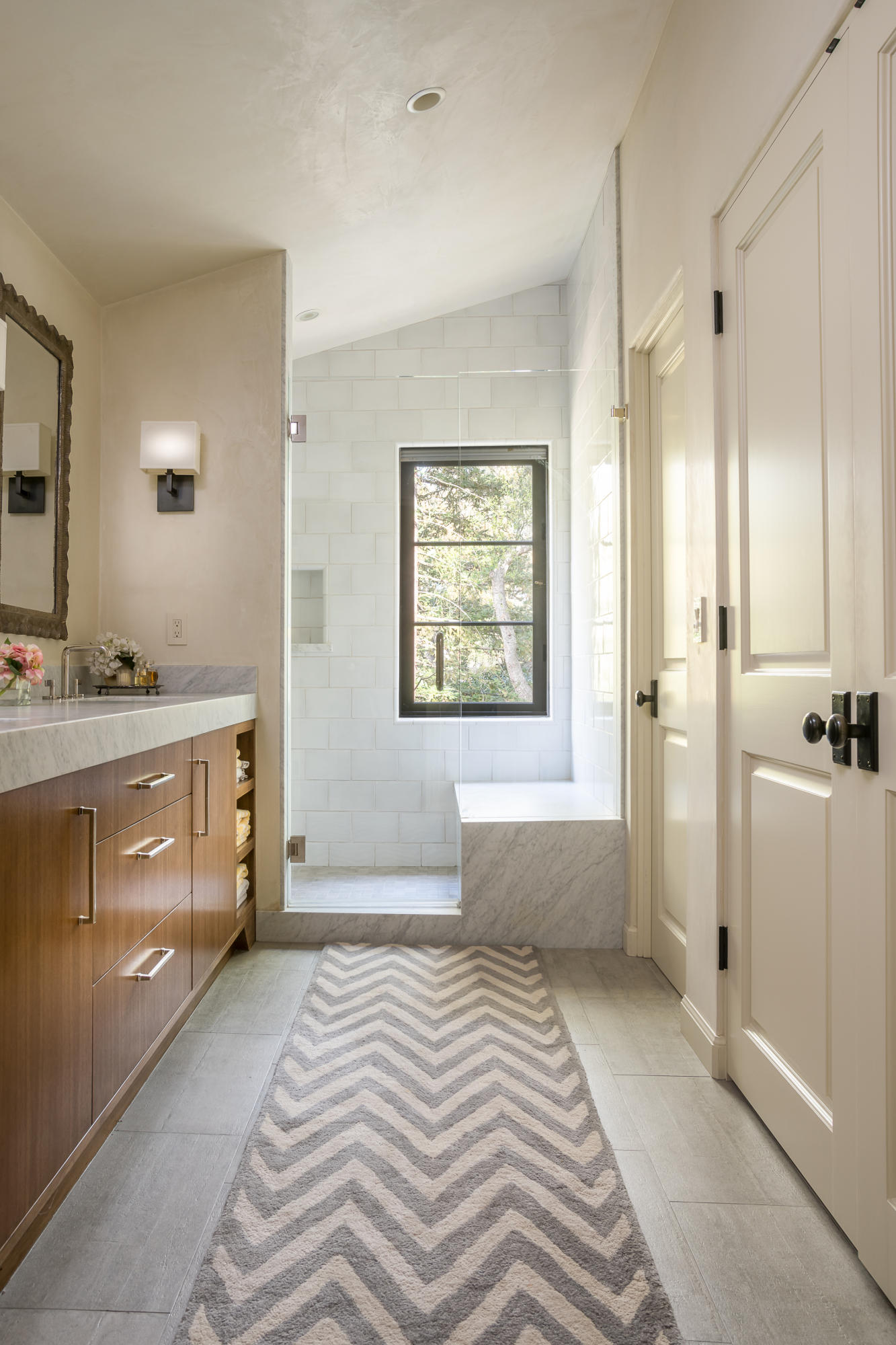 760 Riven Rock Road Montecito, CA 93108 - Photo 30 of 50 a spacious bathroom with a double vanity sink a mirror and a bathtub