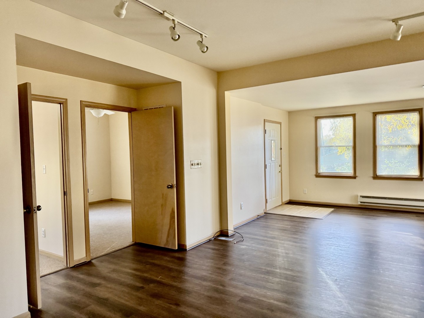 422 Chartres Street LaSalle, IL 61301 - Photo 14 of 21 a view of a big room with wooden floor and windows