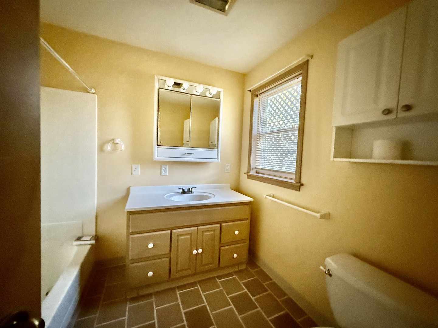 422 Chartres Street LaSalle, IL 61301 - Photo 19 of 21 a bathroom with a granite countertop toilet sink and mirror