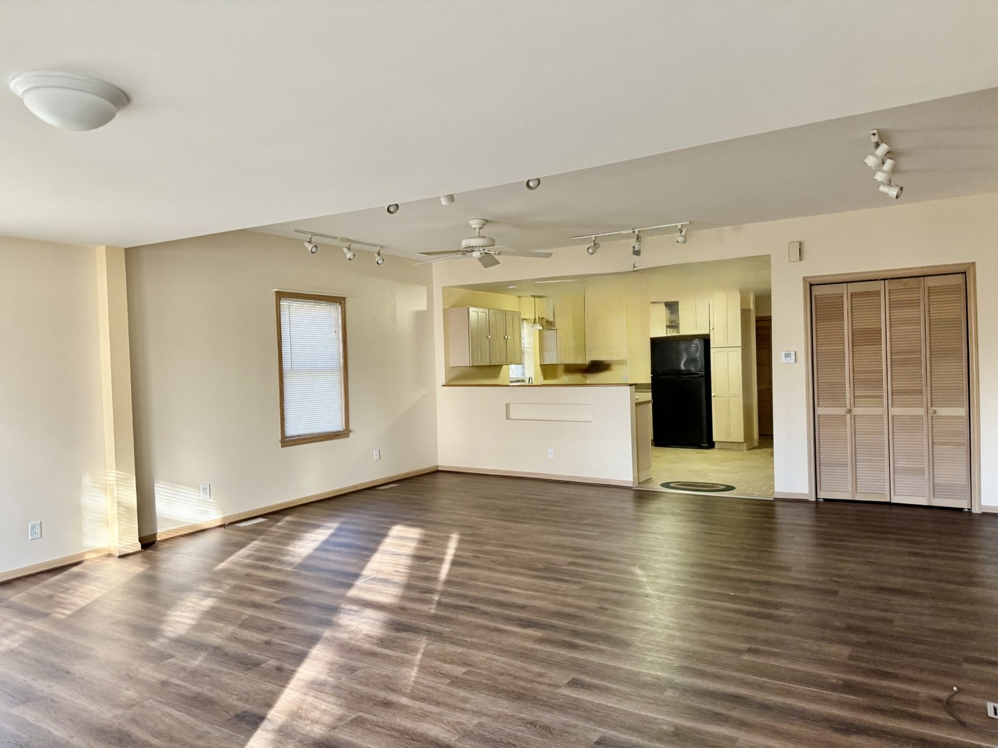 422 Chartres Street LaSalle, IL 61301 - Photo 8 of 21 a view of an empty room with window and wooden floor