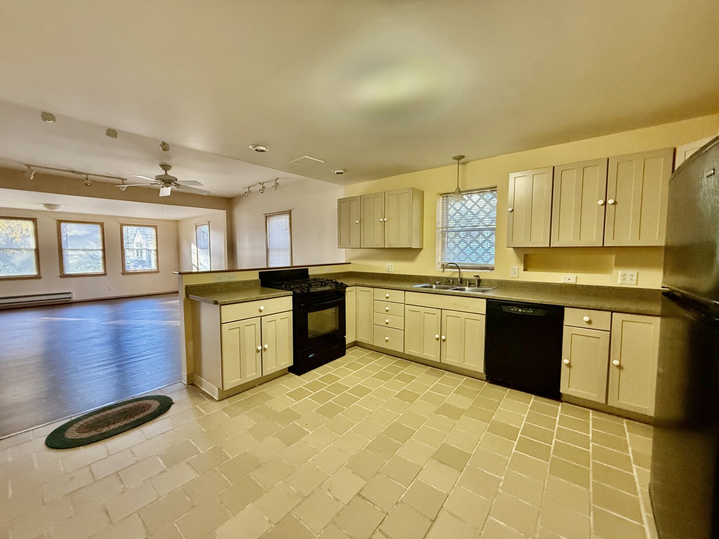 422 Chartres Street LaSalle, IL 61301 - Photo 10 of 21 a kitchen with stainless steel appliances granite countertop a stove sink and cabinets