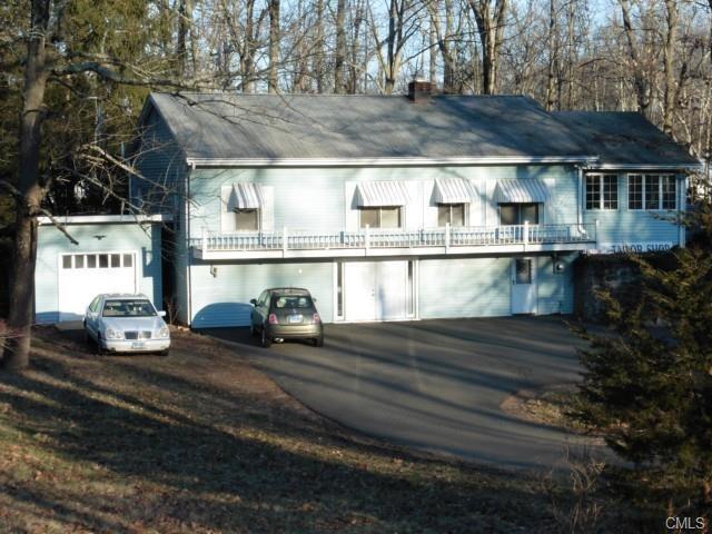 714 Main Street Monroe, CT 06468 - Photo 1 of 1 a view of a house with backyard and sitting area