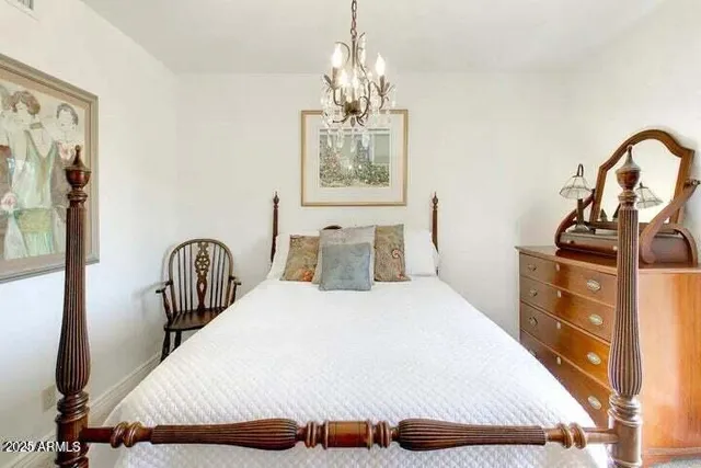 a bathroom with a granite countertop sink a toilet and a shower