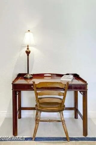 a view of a yard with a house in the background