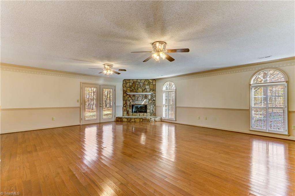 1702 Pineview Road Randleman, NC 27317 - Photo 12 of 30 DEN WITH STONE GAS LOG FIREPLACE