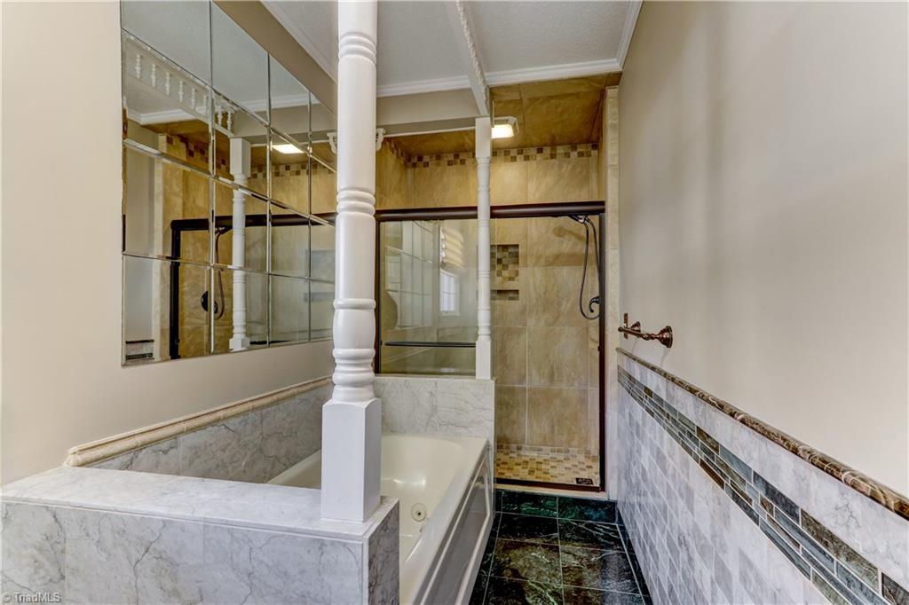 1702 Pineview Road Randleman, NC 27317 - Photo 19 of 30 GORGEOUS MASTER SUITE WITH JETTED TUB & SEPARATE TILE SHOWER