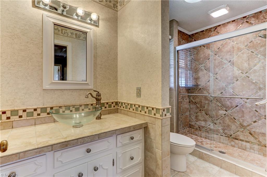 1702 Pineview Road Randleman, NC 27317 - Photo 23 of 30 FULL BATHROOM ON 2ND LEVEL WITH BEAUTIFUL TILE SHOWER