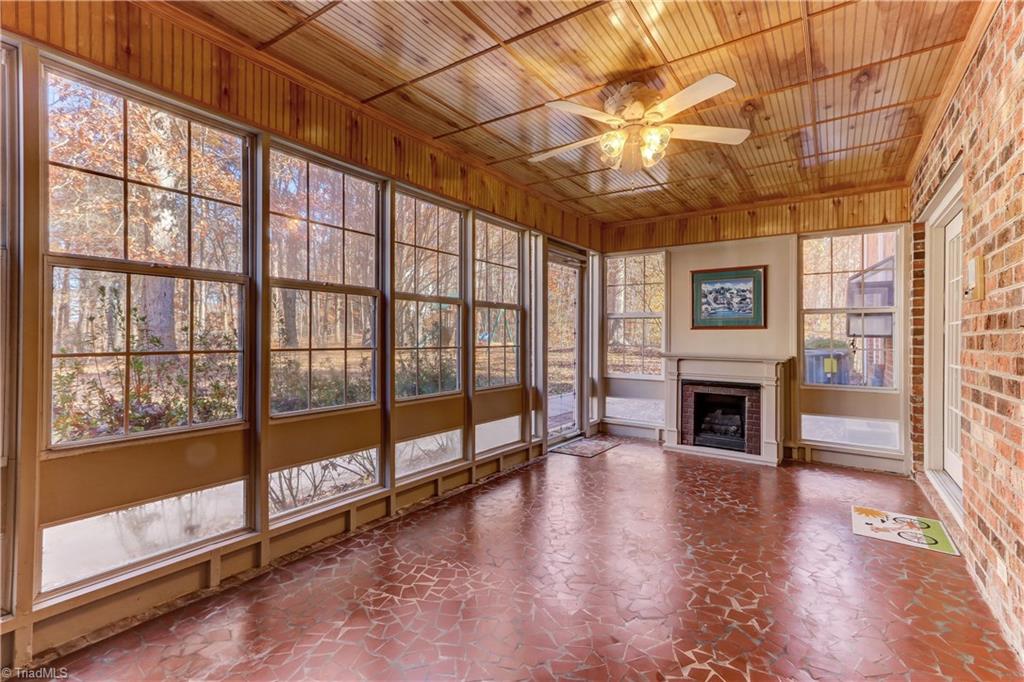 1702 Pineview Road Randleman, NC 27317 - Photo 27 of 30 SUN ROOM WITH PRIVACY IN BACK OF HOME