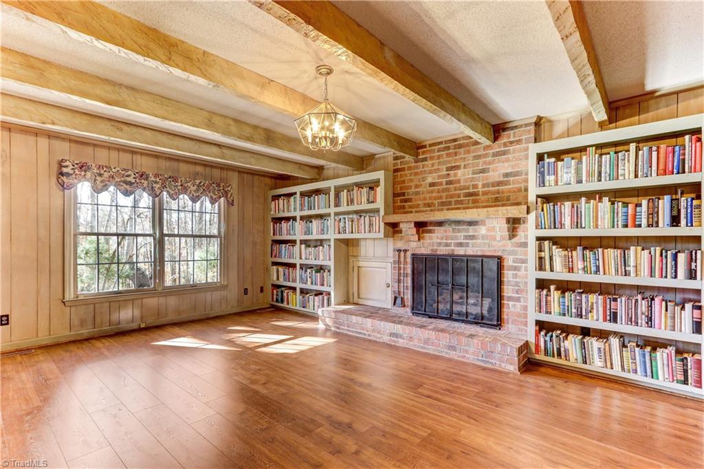 1702 Pineview Road Randleman, NC 27317 - Photo 9 of 30 LARGE LIBRARY WITH EXPOSED BEAMS & GAS LOG FIREPLACE