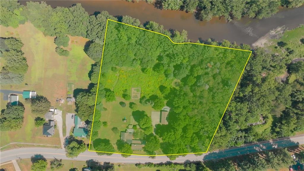 21368 Church Street Venango, PA 16440 - Photo 13 of 49 an aerial view of a residential houses with outdoor space and trees all around