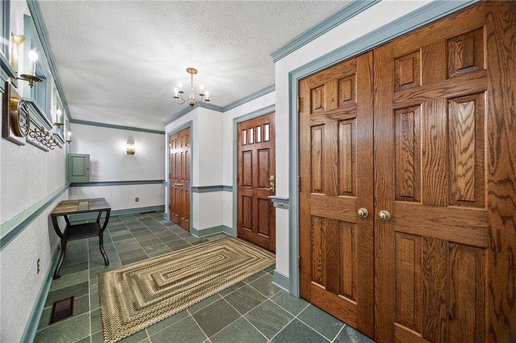 21368 Church Street Venango, PA 16440 - Photo 14 of 49 a view of a hallway with a dining area