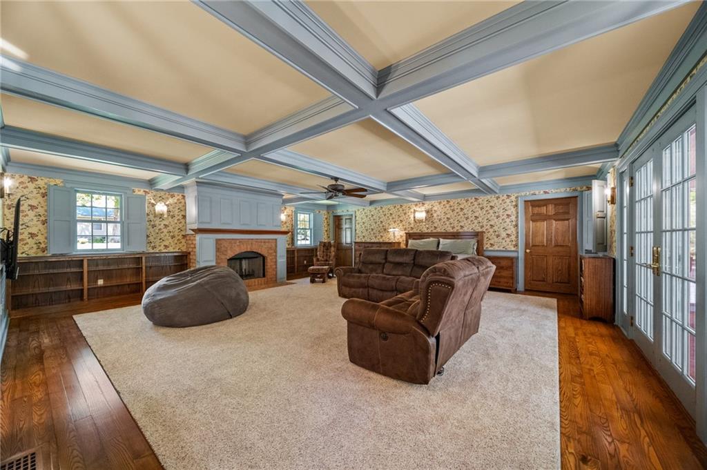 21368 Church Street Venango, PA 16440 - Photo 18 of 49 a room with furniture and a fireplace
