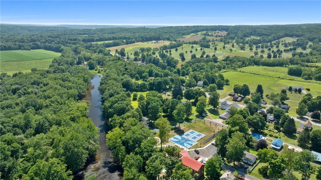 21368 Church Street Venango, PA 16440 - Photo 2 of 49 an aerial view of residential houses with outdoor space and trees