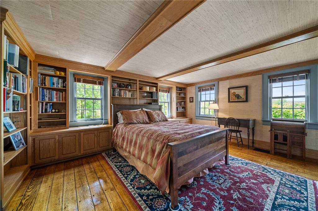 21368 Church Street Venango, PA 16440 - Photo 27 of 49 a bedroom with a bed and wooden floor
