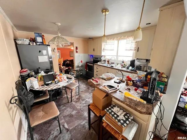 a room with lots of furniture and gym equipment