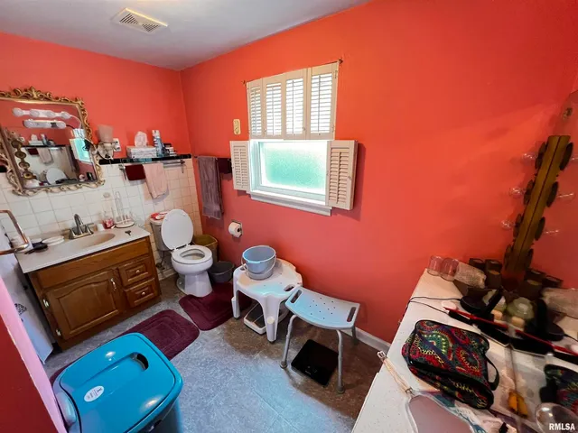 a room with furniture and a window