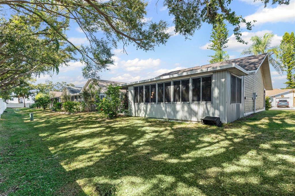 3721 43rd Avenue West Bradenton, FL 34205 - Photo 23 of 26 a view of a house with a garden