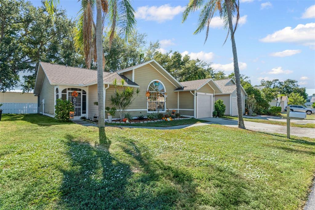 3721 43rd Avenue West Bradenton, FL 34205 - Photo 25 of 26 a front view of house with yard and green space
