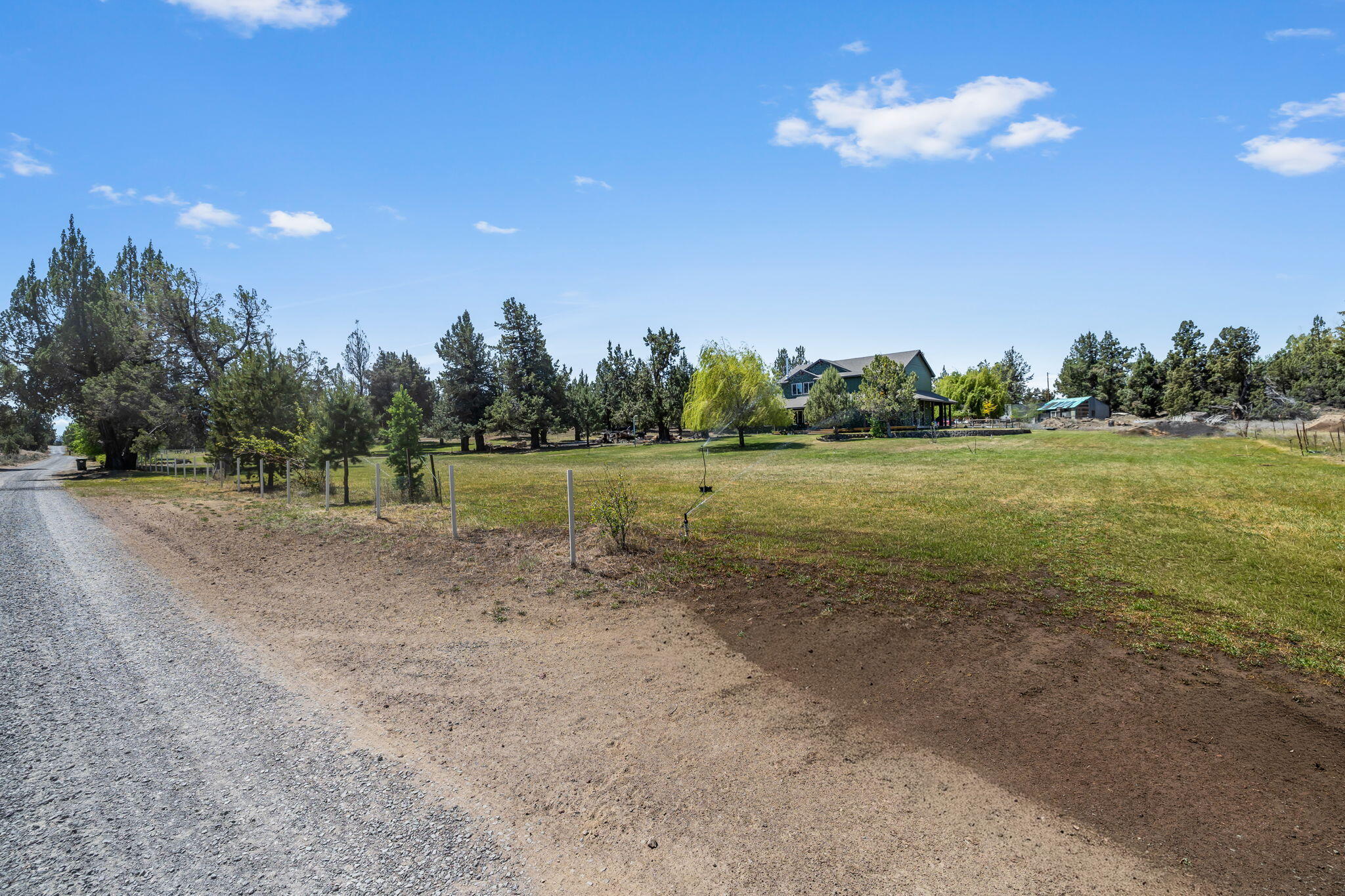 63639 Gentry Loop Bend, OR 97701 - Photo 5 of 40 a view of a big room with a big yard
