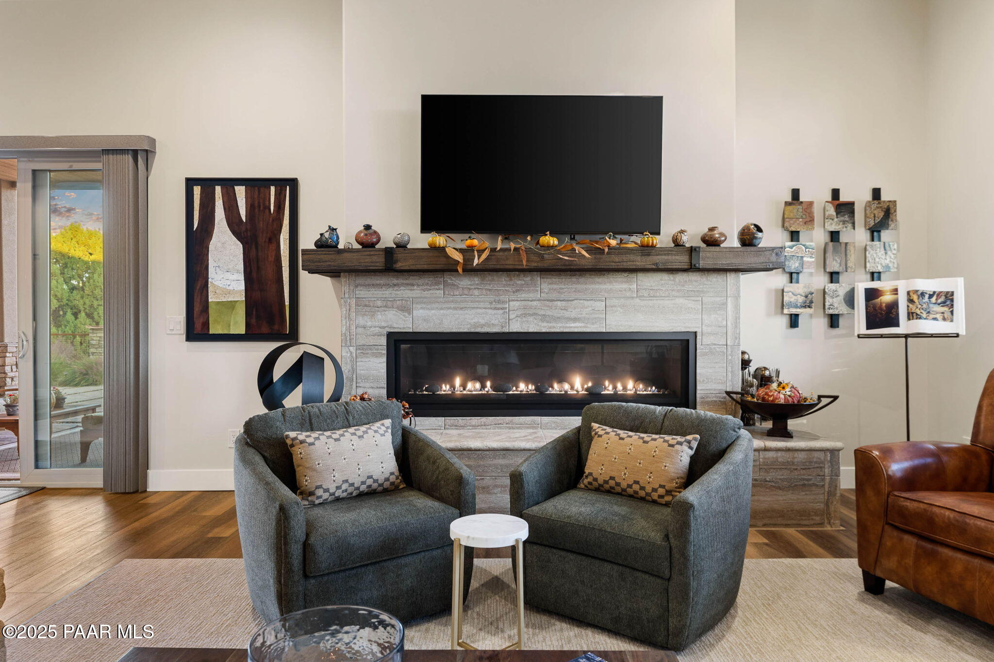 15505 North Double Adobe Road Prescott, AZ 86305 - Photo 26 of 84 a living room with furniture and a fireplace
