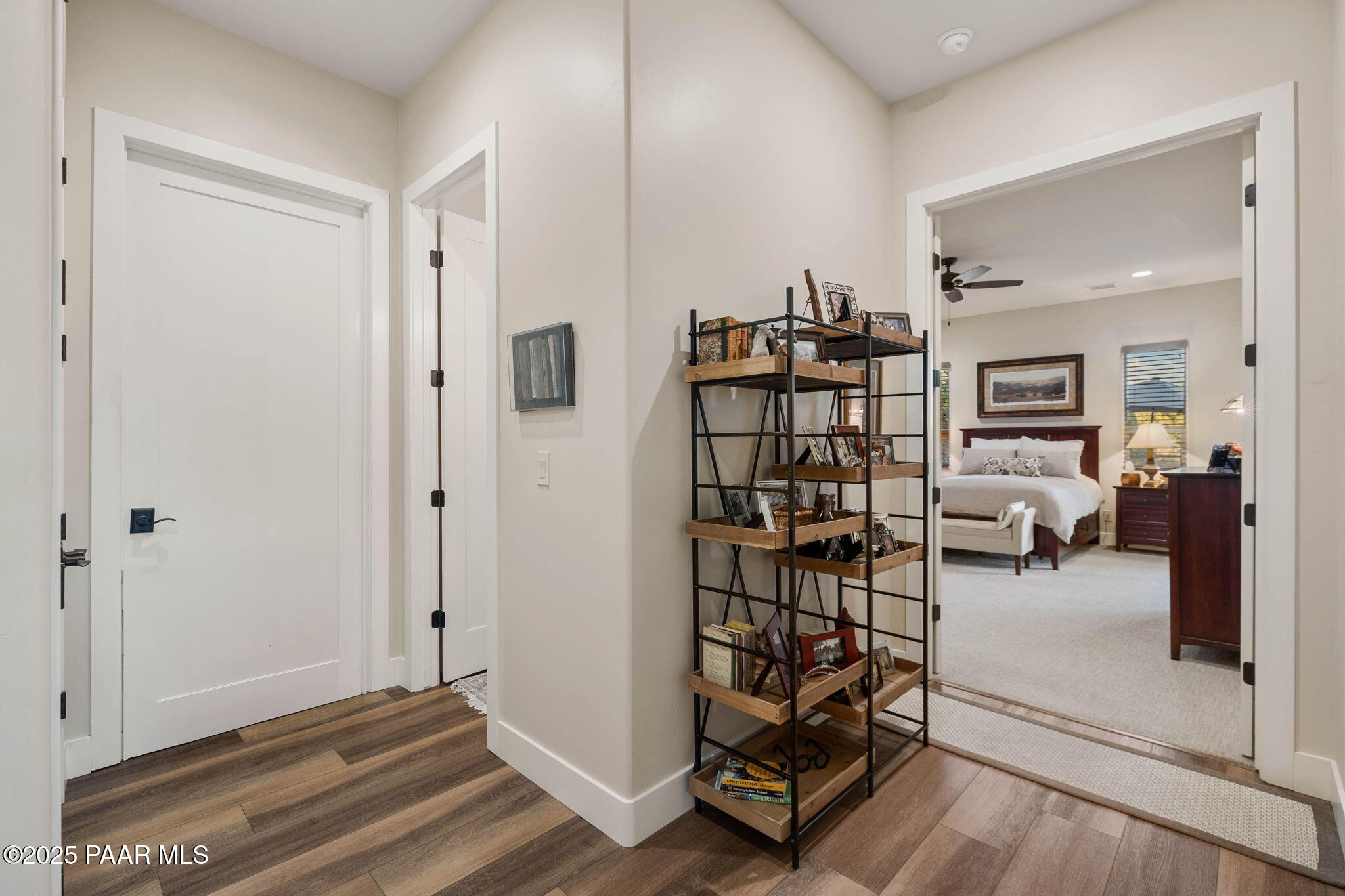 15505 North Double Adobe Road Prescott, AZ 86305 - Photo 43 of 84 a view of a hallway with wooden floor and windows
