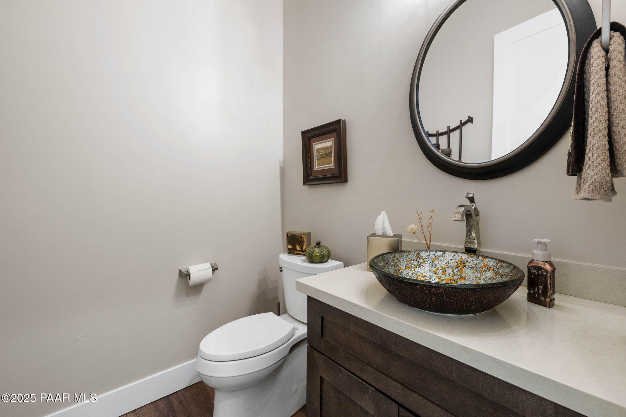 15505 North Double Adobe Road Prescott, AZ 86305 - Photo 44 of 84 a bathroom with a toilet a sink and a mirror