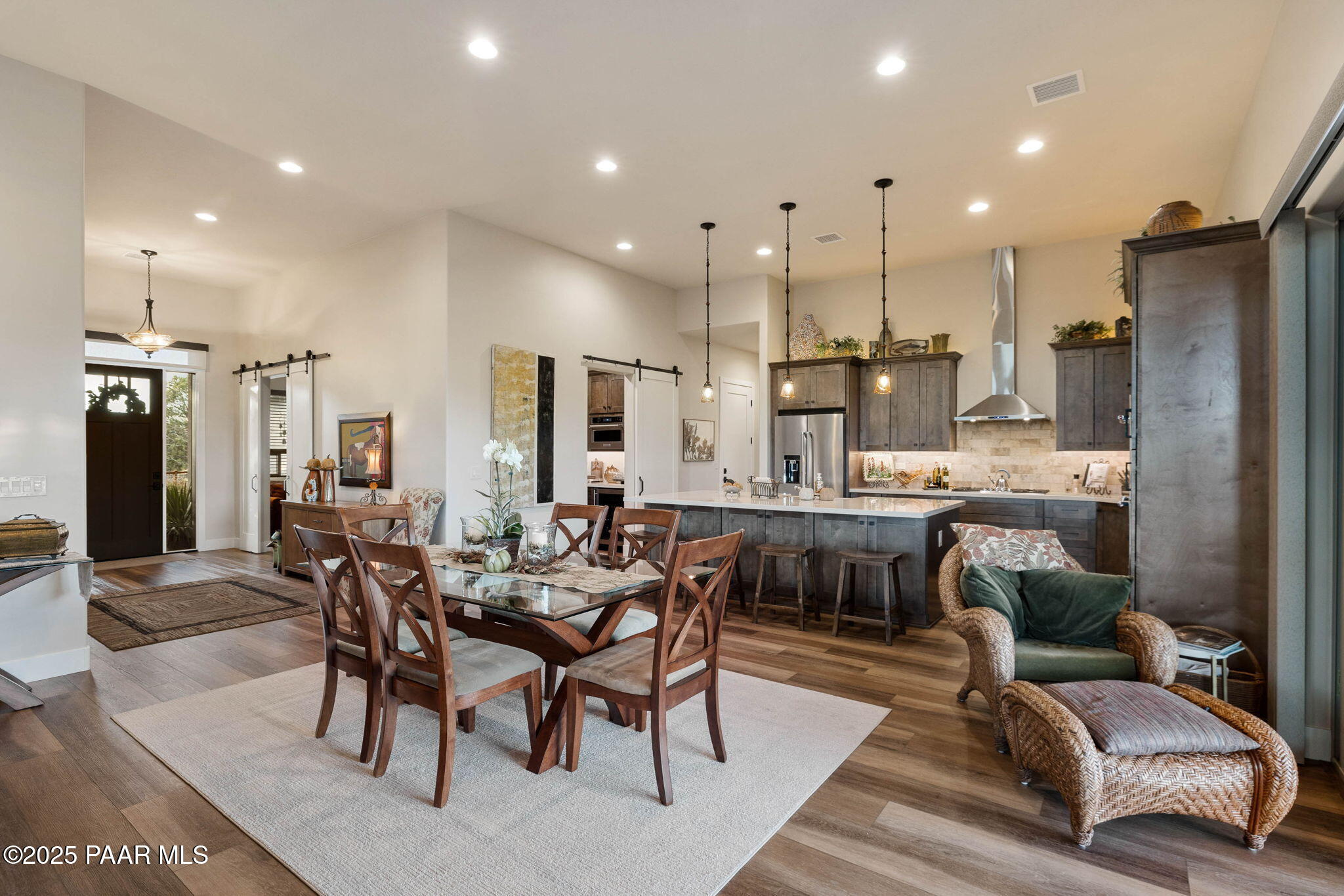 15505 North Double Adobe Road Prescott, AZ 86305 - Photo 10 of 84 a large kitchen with a table and chairs
