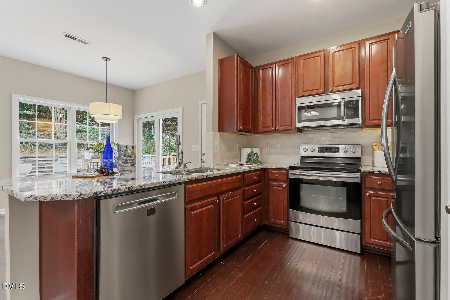 8201 Joyce Glow Court Raleigh, NC 27613 - Photo 10 of 47 014-056-Kitchen-1500x1000