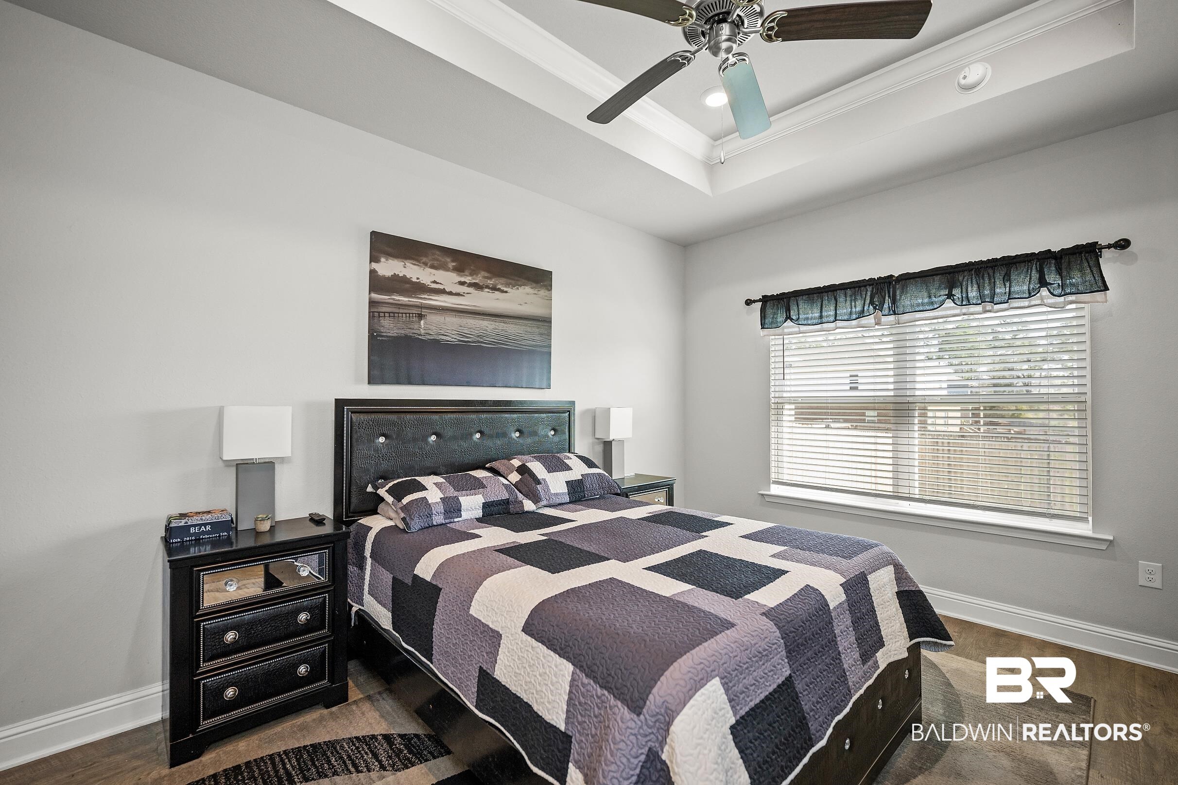 31468 Memphis Loop Daphne, AL 36527 - Photo 9 of 24 Bedroom with dark wood-style floors, ornamental molding, ceiling fan, recessed lighting, and a tray ceiling