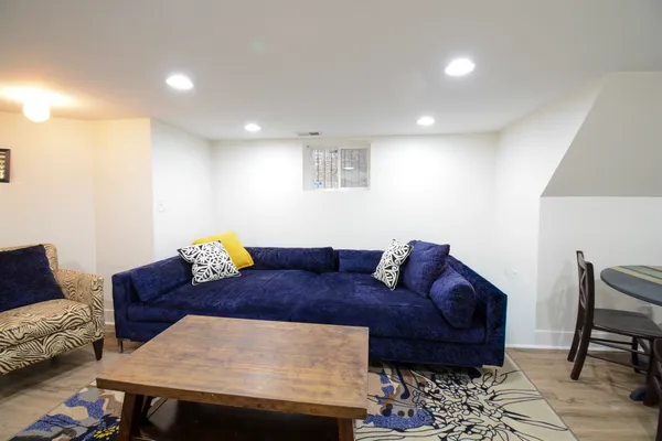 a living room with furniture and a couch