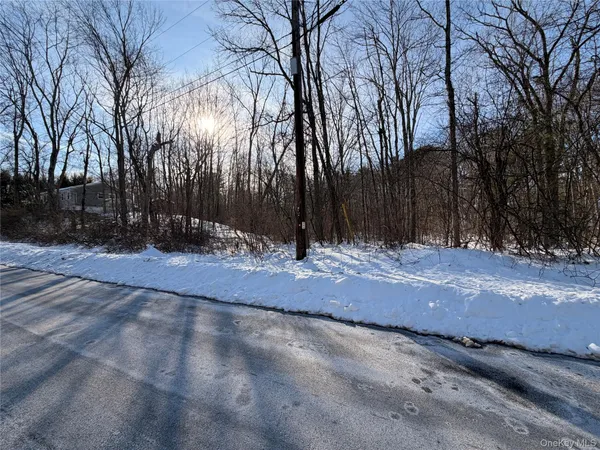 a view of road with trees