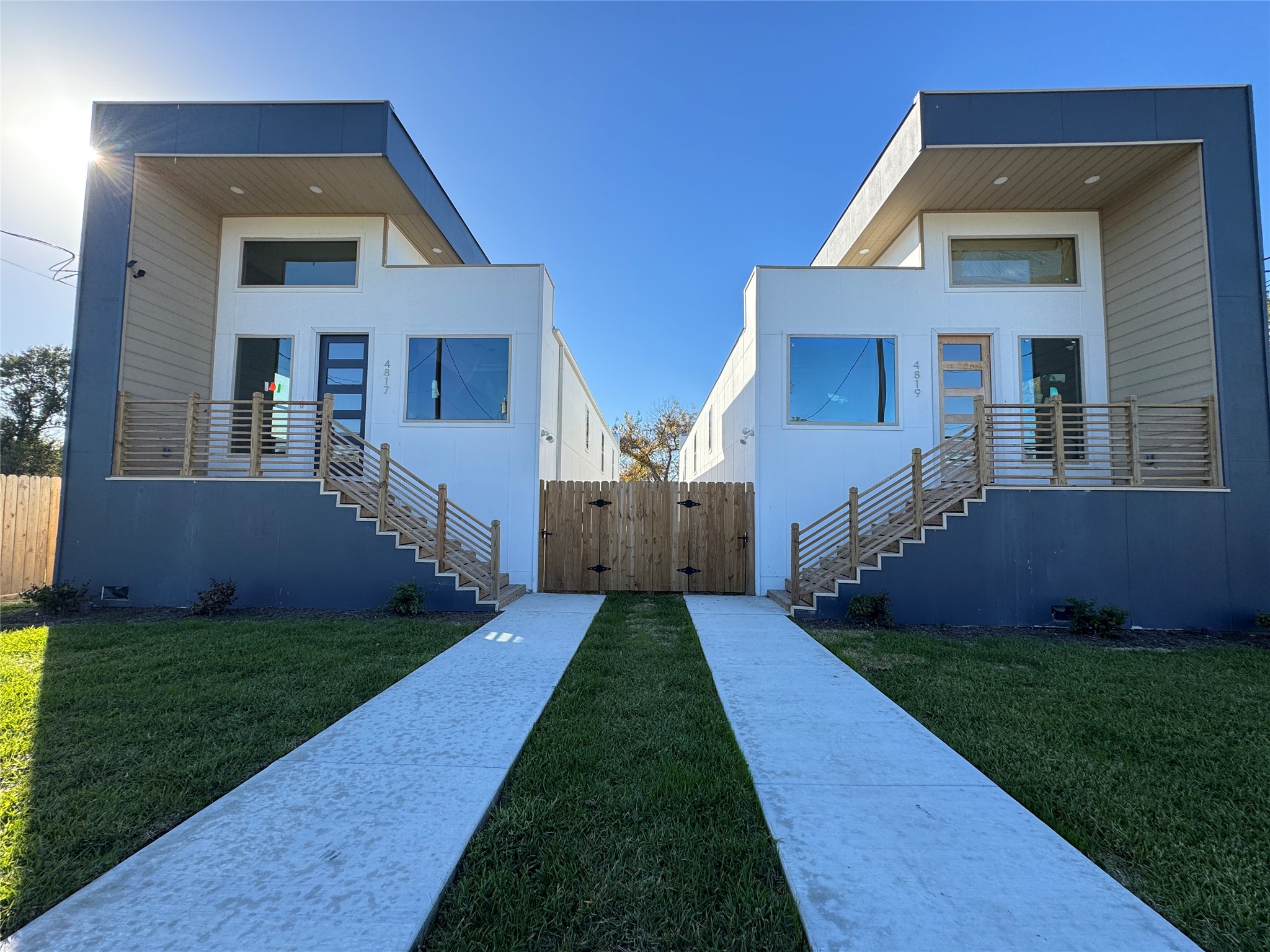 a front view of a house with yard