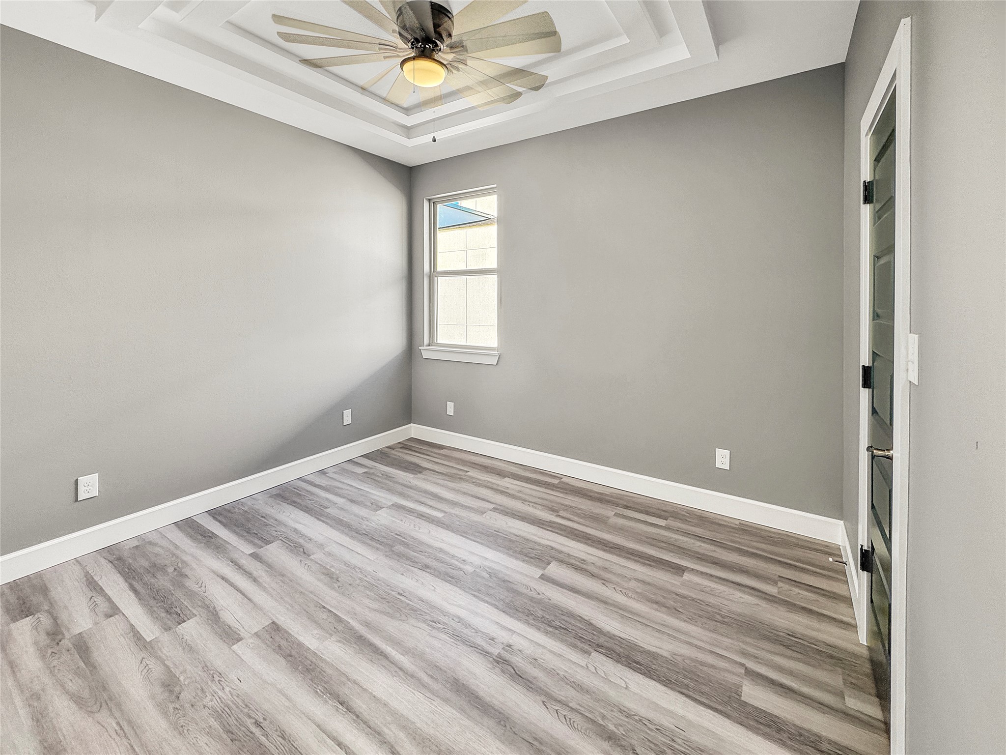 4817 Los Angeles Street Houston, TX 77026 - Photo 11 of 20 a view of empty room with wooden floor and fan