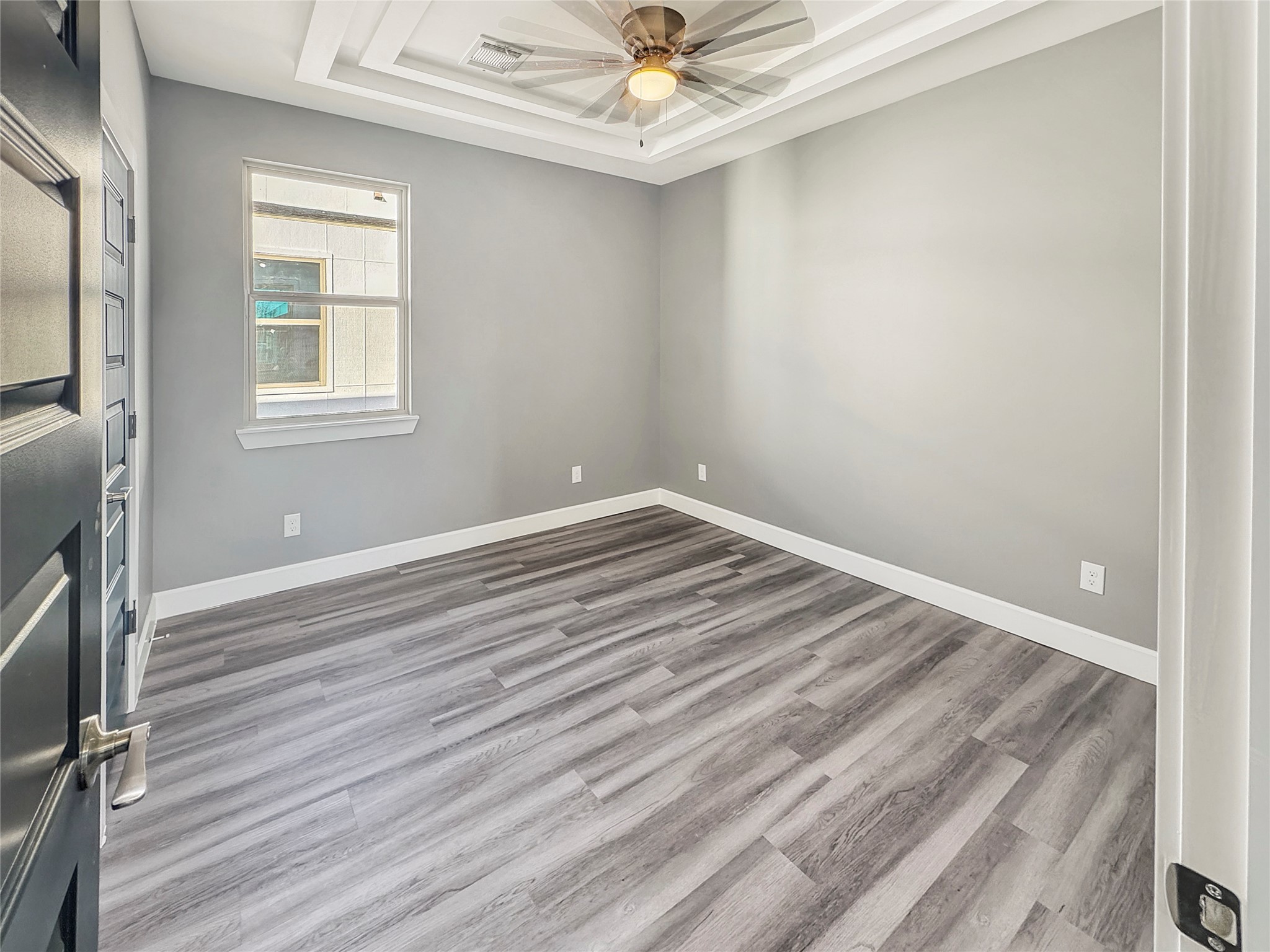 4817 Los Angeles Street Houston, TX 77026 - Photo 14 of 20 a view of a room that has a bed and a window