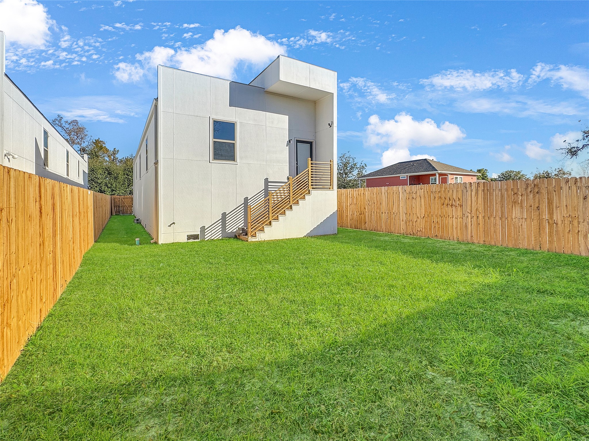 4817 Los Angeles Street Houston, TX 77026 - Photo 20 of 20 a view of a backyard with a garden
