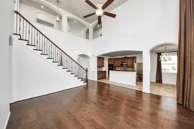 a view of an entryway with wooden floor