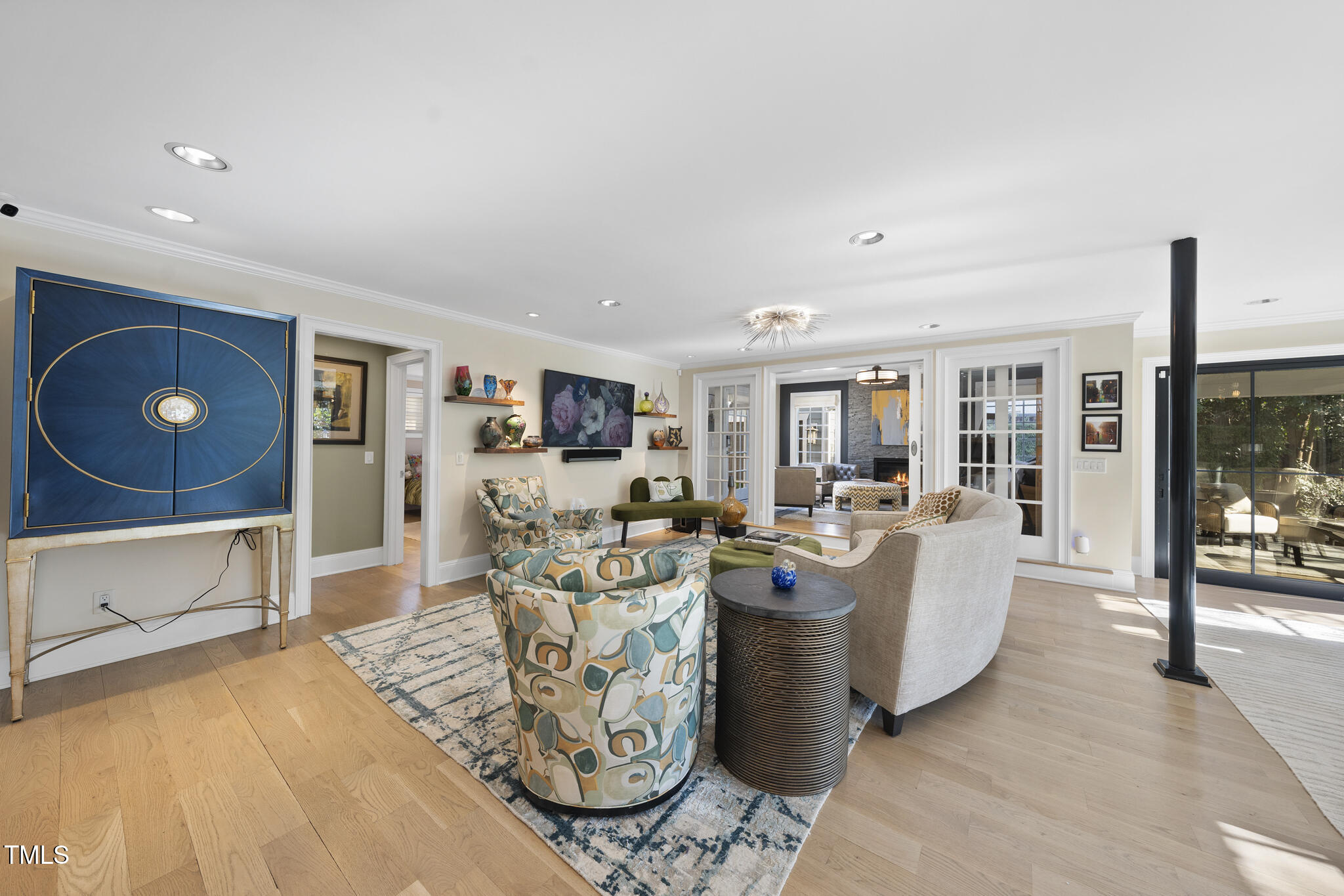 920 West Johnson Street Raleigh, NC 27605 - Photo 11 of 42 a living room with furniture and a flat screen tv