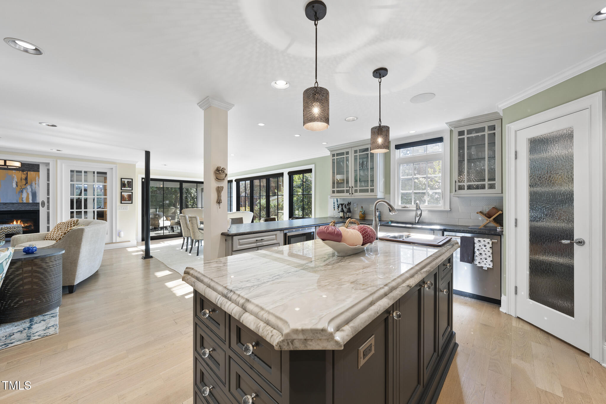 920 West Johnson Street Raleigh, NC 27605 - Photo 15 of 42 a kitchen with center island table and chairs