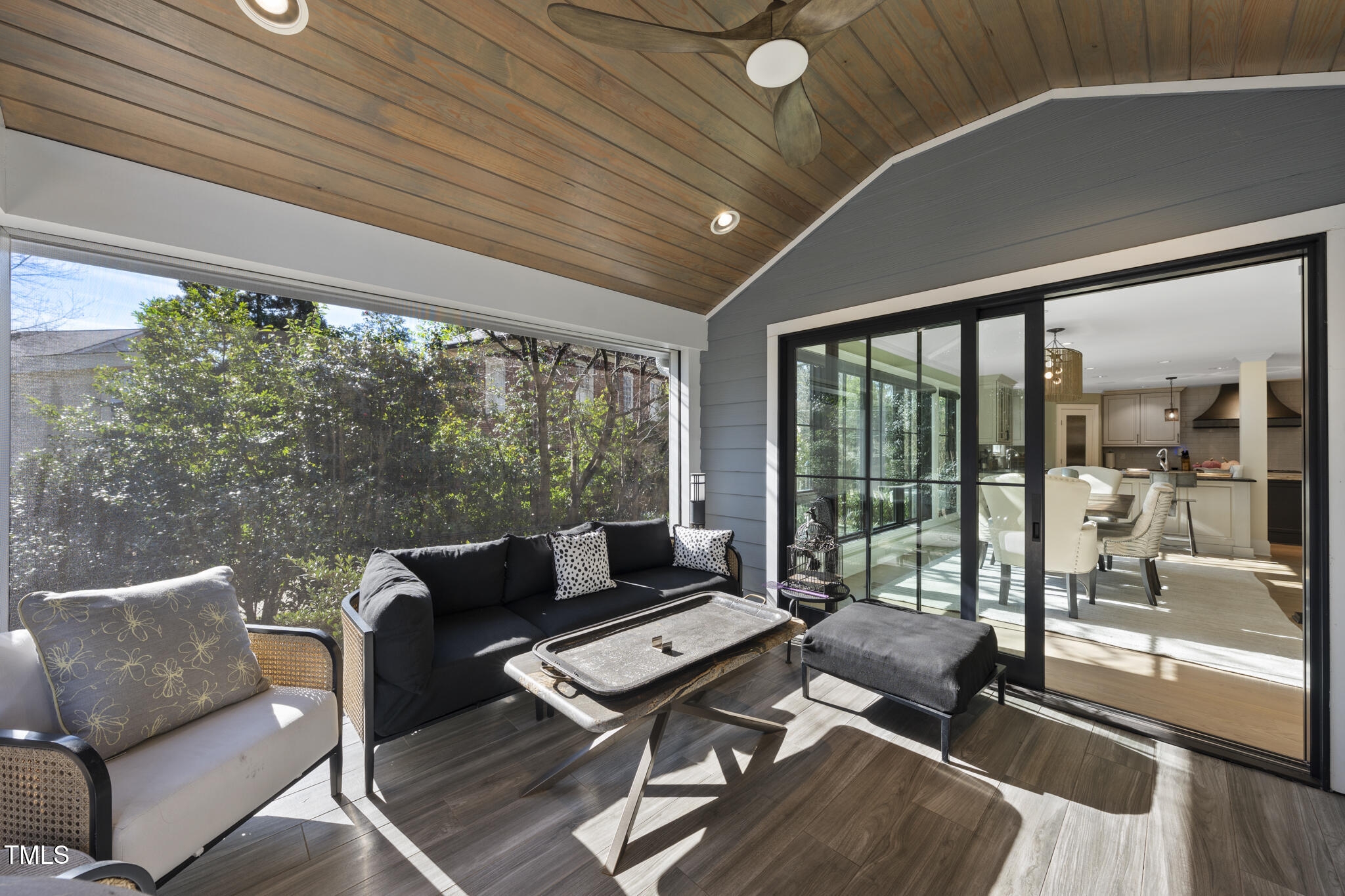 920 West Johnson Street Raleigh, NC 27605 - Photo 16 of 42 a living room with furniture and a floor to ceiling window