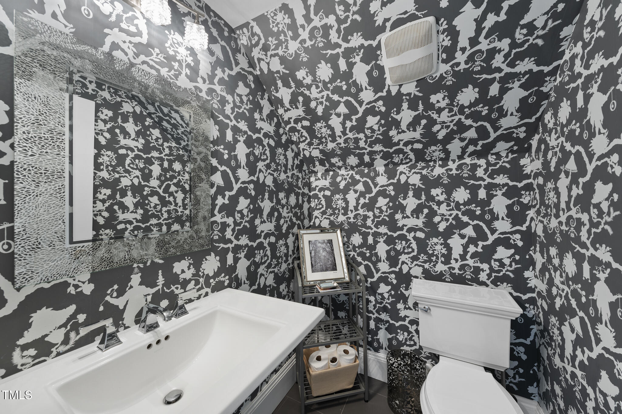 920 West Johnson Street Raleigh, NC 27605 - Photo 24 of 42 a bathroom with a sink and a toilet