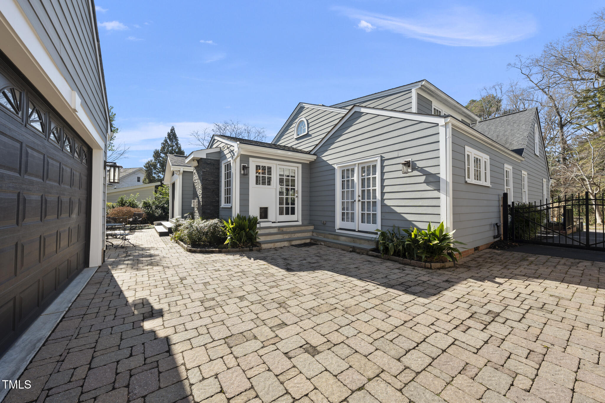 920 West Johnson Street Raleigh, NC 27605 - Photo 30 of 42 a view of a house with a small yard and a large window